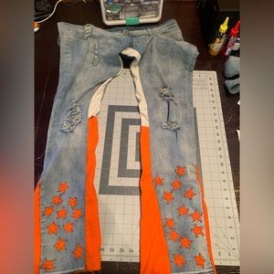 Cream and orange flare blue jeans